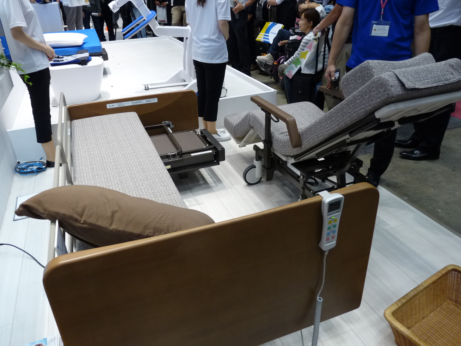 A portion of the electric care bed, "Resyone," transforms into an electric wheelchair.
