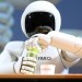 Honda's latest Asimo humanoid robot can interpret postures, gestures and facial expressions and control its fingers. Photo credit: BLOOMBERG